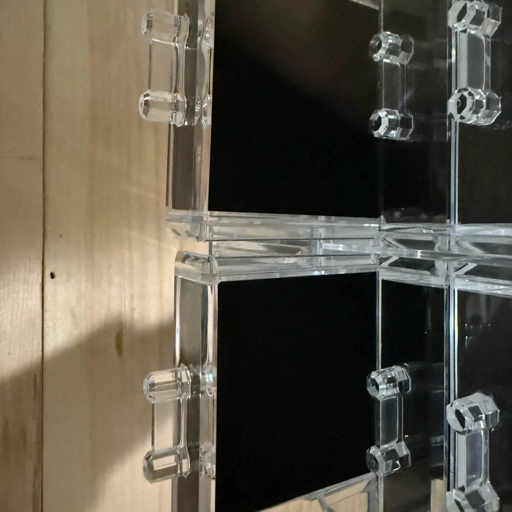 Sleek Acrylic Makeup Organizer with Black Detailing